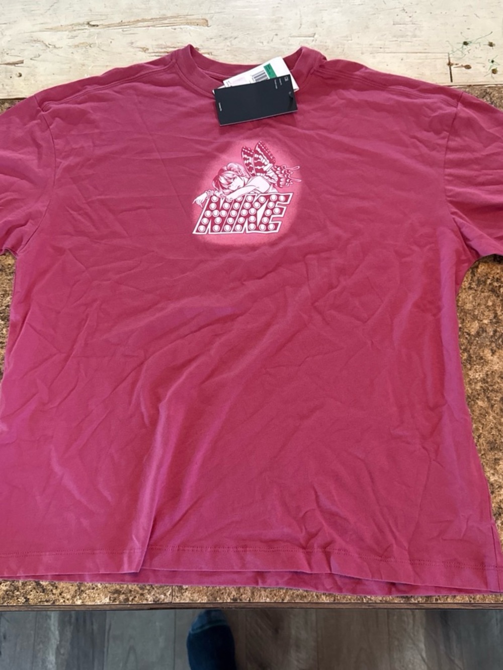 Nike Women's Short Sleeve Tee in Rose Pink with Center Graphic
